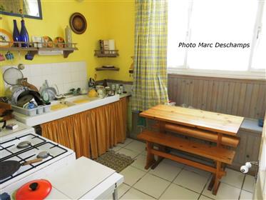 Semi-Detached village house on one side, renovated, 2 bedrooms, ~ 92m² of living space, barn and ga