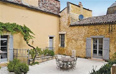 A delightful and carefully restored property set around an enclosed courtyard and situated in the ce