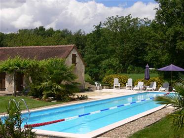 Farmhouse with 20m pool and beautiful grounds.